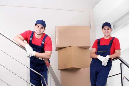 Careful loading of furniture and boxes into a removals van