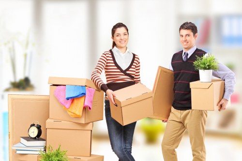 Packed household boxes and furniture ready for a local move