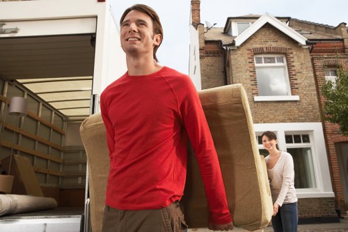 Local movers loading household items into a van in Toedinburgh