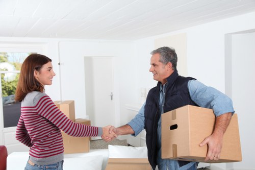 Loading household furniture into a removals van
