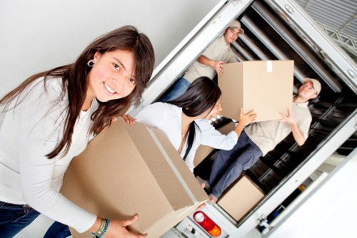 Local van service helping with a flat move and access challenges
