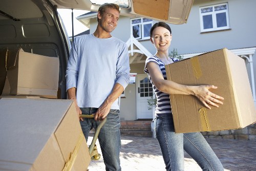 Boxes and household items organized for transport in a moving van