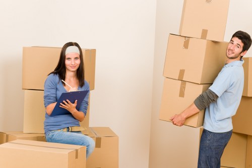 Loading household items into a removal truck